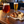 Copper and golden beers with pretzel, cheese and mustard as a serving suggestion