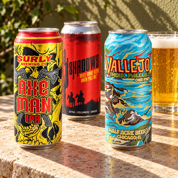 Illustrative selection of craft IPA cans with poured beer