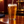 Illustrative close-up of clear golden IPA being poured into a glass