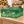 Green Holiday Sweater Wine Advent Calendar - 24 Mini Bottles - 187 ml in a warm holiday setting