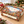 Craft beer advent calendar displayed with wrapped gifts and a Christmas tree