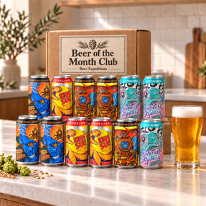 Illustrative craft beer selection with Beer of the Month Club branded box on a kitchen counter
