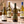 Illustrative four distinct white wines on marble; actual selections vary