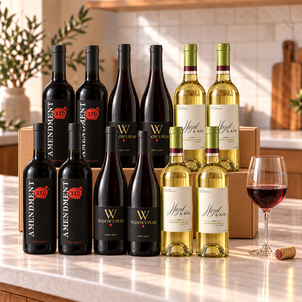 Illustrative 12-bottle mixed red and white wine selection on a kitchen counter