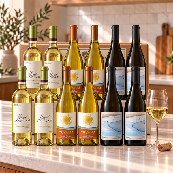 Illustrative 12-bottle white wine selection on marble with Wine of the Month Club branded shipping box behind the bottles