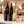 Illustrative 6-bottle mixed red and white wine selection on marble with Wine of the Month Club branded shipping box behind the bottles