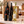 Illustrative 6-bottle mixed red and white wine selection on a kitchen counter